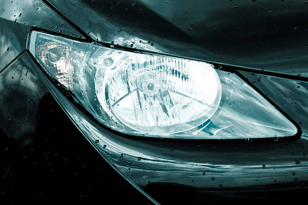 istock headlamp on black car 147503039