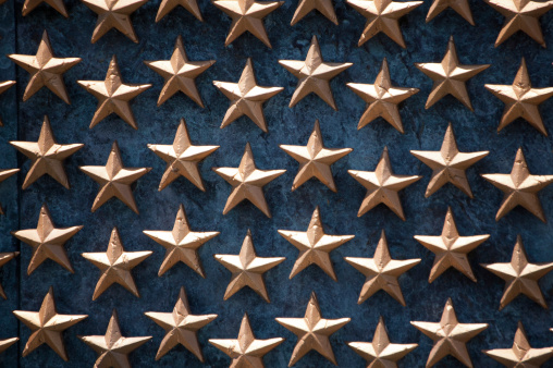 This wall is part of the World War II Memorial in Washington, DC. Each star represents 100 soldiers who were killed in the war. There is a total of 4048 stars on the Freedom Wall. This close-up offers a great view of the stars that are part of the monument.