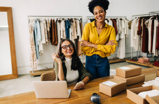 istock Small business success: Women working together in ecommerce 1475033021