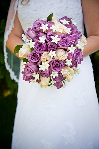 istock Purple and Ivory Rose Wedding Bouquet 147503309