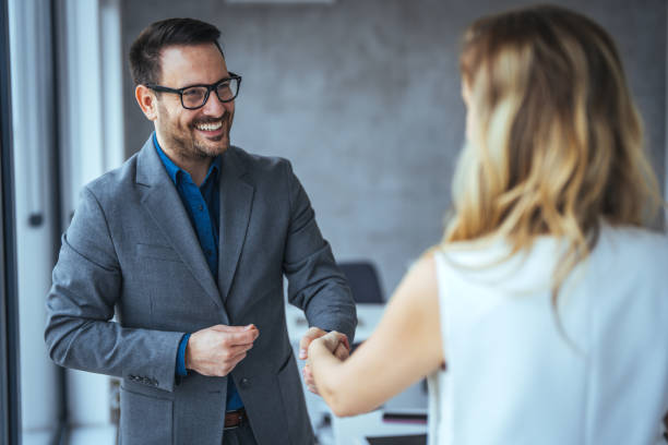 Business people shaking hands after successful meeting. stock photo