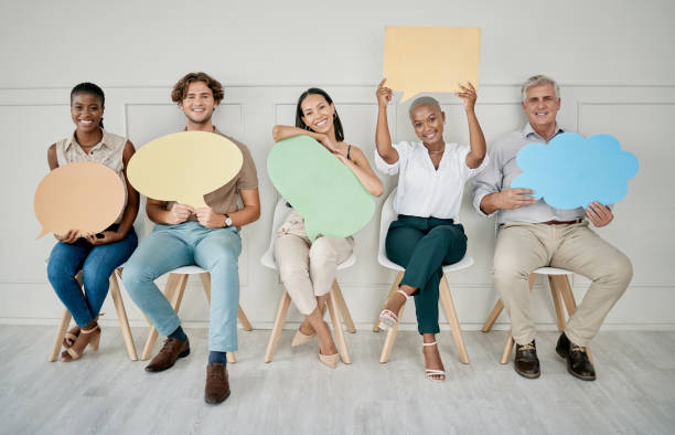 istock Business people, queue and interview with speech bubble, mockup vote and opinion space in office for job. Group diversity, recruitment and opinion for social media, chat or digital marketing company 1475037159