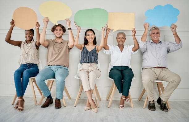 istock Business people, queue and interview with speech bubble, mockup vote and opinion space in office for job. Group diversity, recruitment and opinion for social media, chat or digital marketing company 1475037167