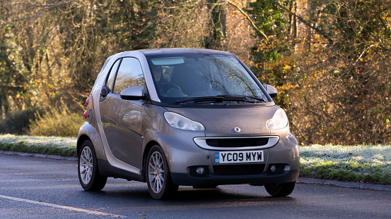 Milton Keynes, Bucks, UK Dec 10th 2022. 2009 Smart FORTWO PASSION CDI AUTO small car travelling on an English country road