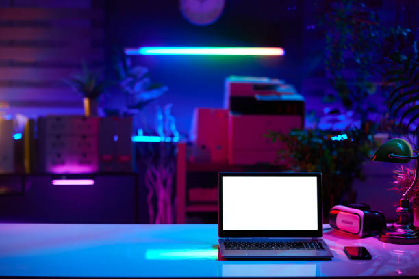 istock modern office with desk, laptop blank screen and vr headset 1475042472