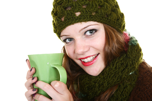 Young girl with cup of tea
