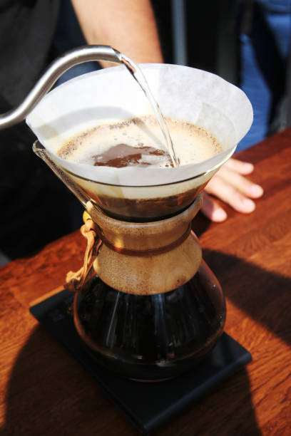 istock Using professional barista chemex pour coffee maker and drip kettle 1475049634