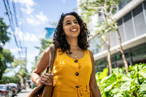 Businesswoman walking in the street