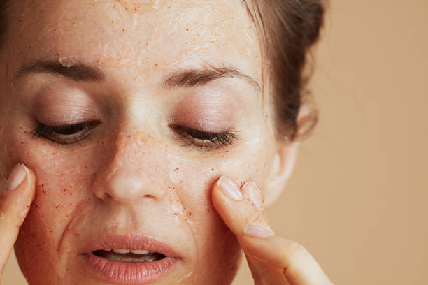 istock Closeup on woman with face scrub 1475051056