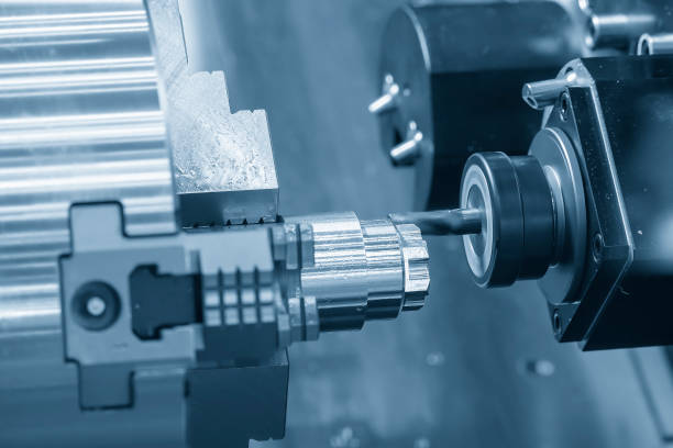 istock The high technology metal working with CNC turning machine. 1475054725
