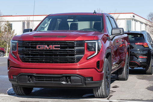 Carmel - Circa March 2023: GMC Sierra 1500 pickup display at a dealership. GMC offers the Sierra in HD, HD Pro, AT4 and Denali models.