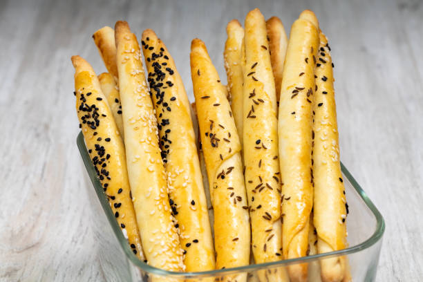 Bread sticks with sesame seeds. Homemade. stock photo