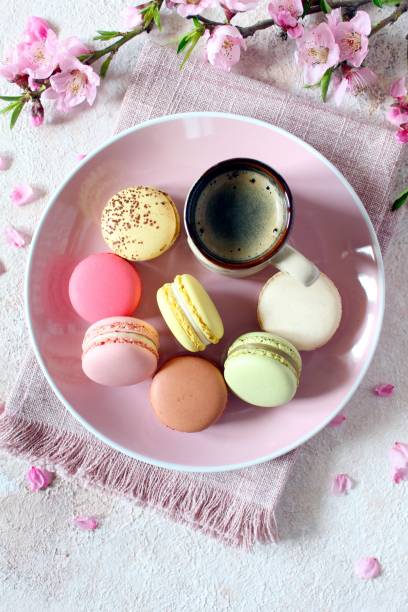 istock Colorful macaroons with coffee on the plate. 1475057985