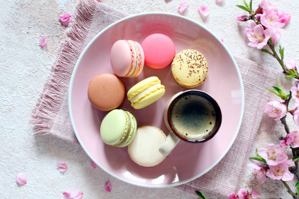 istock Colorful macaroons with coffee on the plate. 1475058010
