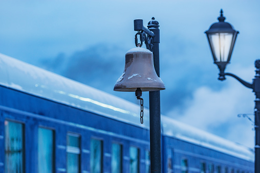 Station bell on the passenger platform.