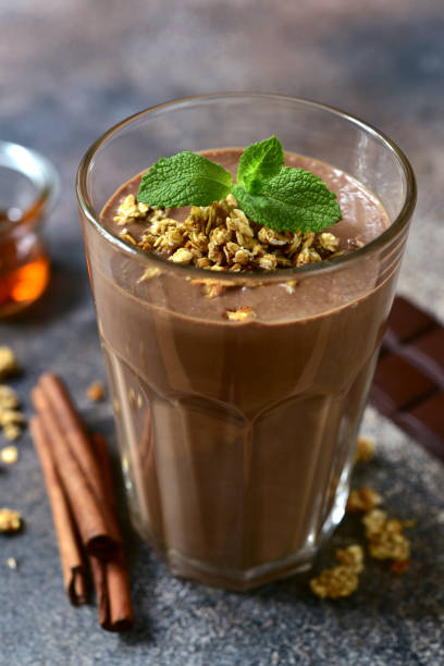 istock Delicious chocolate smoothie with mint and granola. 1475059598