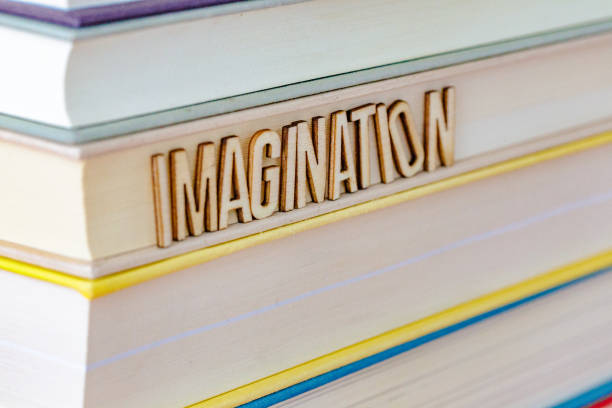 istock Stack of Books with letter tiles spelling the word 'Imagination' 1475060270