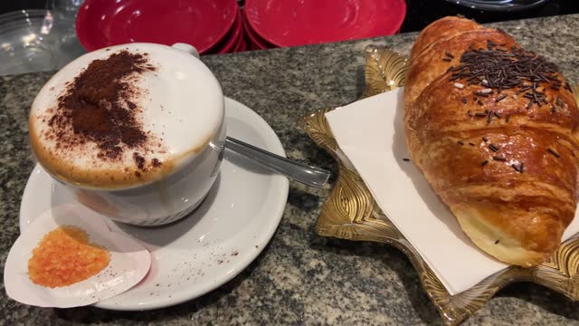Typical Italian breakfast with chocolate brioches