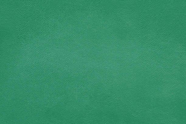 istock Texture of soft green leather. Natural cowhide, abstract background. 1475064240