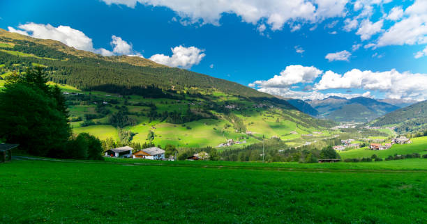 istock typical tyrolean house nestled in the mountains with blue sky 1475064341