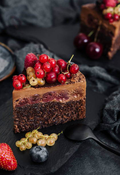 istock Delicious chocolate cake decorated with fresh berries 1475064955