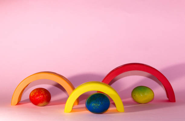 istock colorful easter eggs above colorful plastic toy, creative holiday design 1475065823