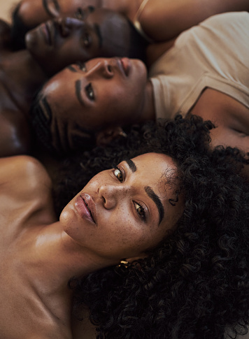 Portrait of attractive models with diverse skin tones posing for beauty, skin and makeup. Natural skincare and makeup.