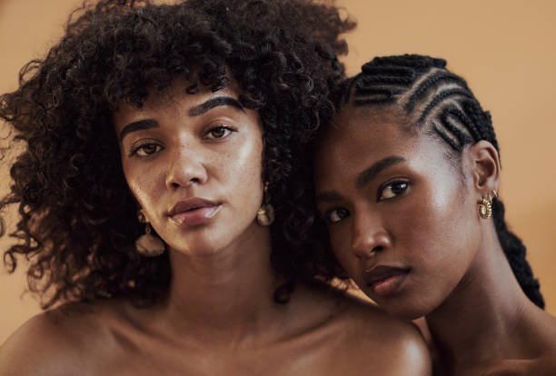 Shades Of Brown Portrait of attractive models with diverse skin tones posing for beauty, skin and makeup. Natural skincare, hair care and makeup. black hair stock pictures, royalty-free photos & images