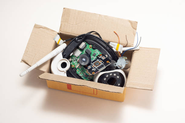 istock broken and damage the IP camera in brown cardboard paper box 1475072647