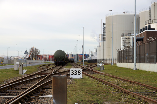 Chemical tank wagons waiting for loading in Pernis Harbor Vondelingenplaat at Koole oil terminal in the Netherlands