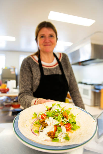 istock A chef with a vegan meal 1475083427