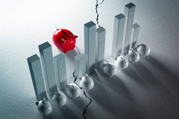 istock Finance graph red and white piggy banks 1475085151