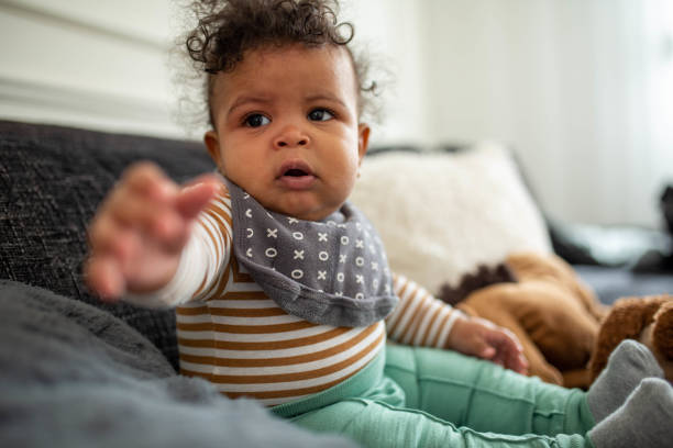istock Baby boy playing with a toy 1475085432