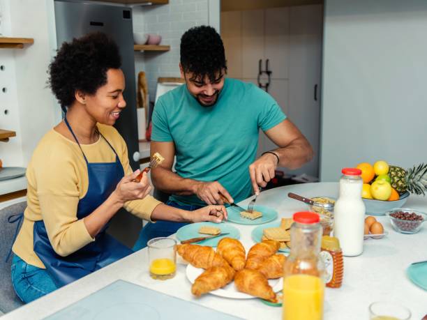 istock Couple enjoying breakfast at home 1475090338