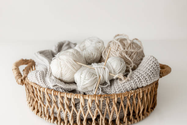 istock Basket with yarn close-up, threads for knitting. 1475091785