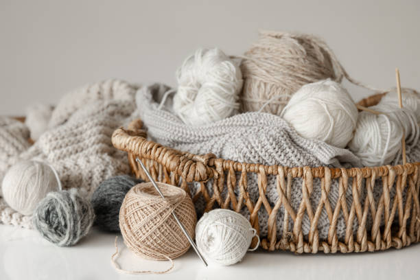 istock Basket with yarn close-up, threads for knitting. 1475091795