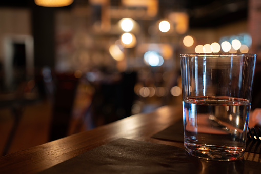 defocused Blurred dark table setting in a restaurant or bar