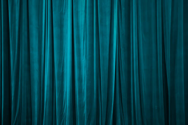 blue curtain in theatre. Textured background