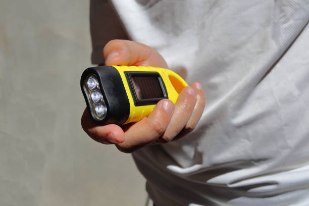 istock A man holds in his hands a hand-crank solar torch 1475101282