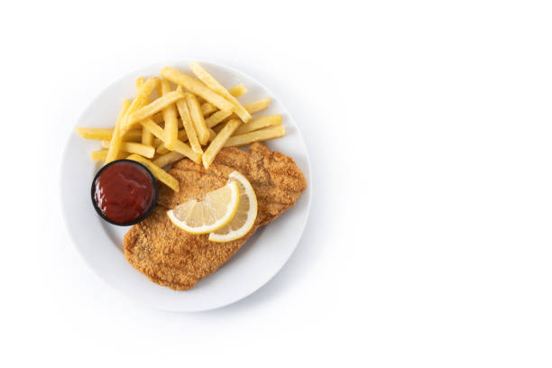 Wiener schnitzel with fried potatoes isolated on white background