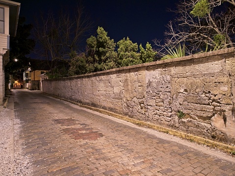 Ancient stone wall in the old town section of Saint Augustine at Aviles and Cadiz streets.