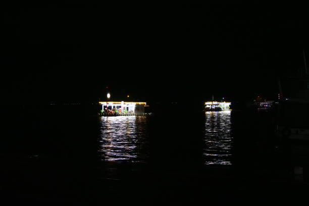 istock The light reflections of two floating fuel stations on the Amazon river during night time, at the busy port of Manaus, Brazil. 1475109019
