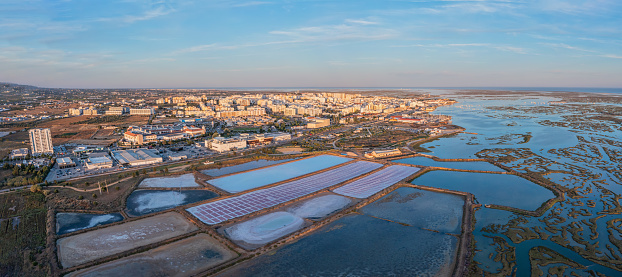 Aerial view of the Ria Formosa park with salt pans in the Portuguese city of Faro. High quality photo