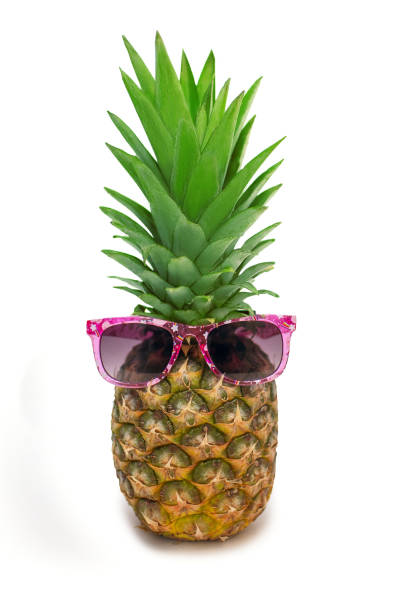 istock Pineapple in sunglasses on a white background 1475116974