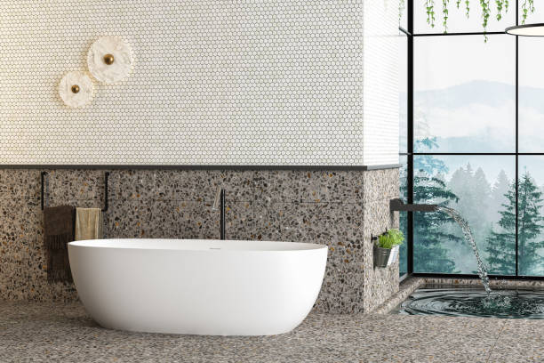 istock Beautiful white bathtub on terrazzo floor in modern bathroom with forest view from window, pool, towel, bath accessories, wall for mock up. 3d Rendering 1475117119