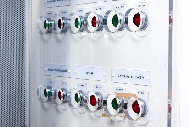 istock Dashboard with buttons to start and stop systems in the ship's engine room. 1475117131