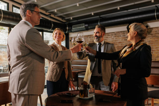 istock Joyful businesspeople toasting. 1475117231