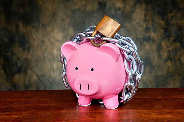 istock Chained piggybank 147511825