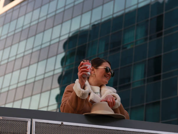 istock Young beautiful casual woman drinking coffee 1475121502