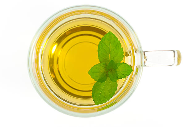 Like tea mint tea with fresh leaves isolated on white, top view Green tea's stock pictures, royalty-free photos & images